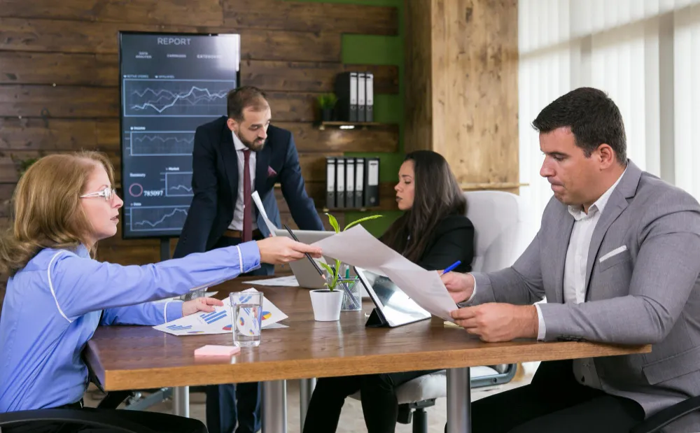 IT professionals managing disaster recovery and business continuity systems in a modern Los Angeles office.